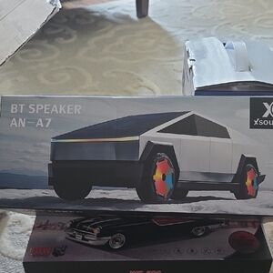 Black and White Portable Bluetooth Speaker with Futuristic Design